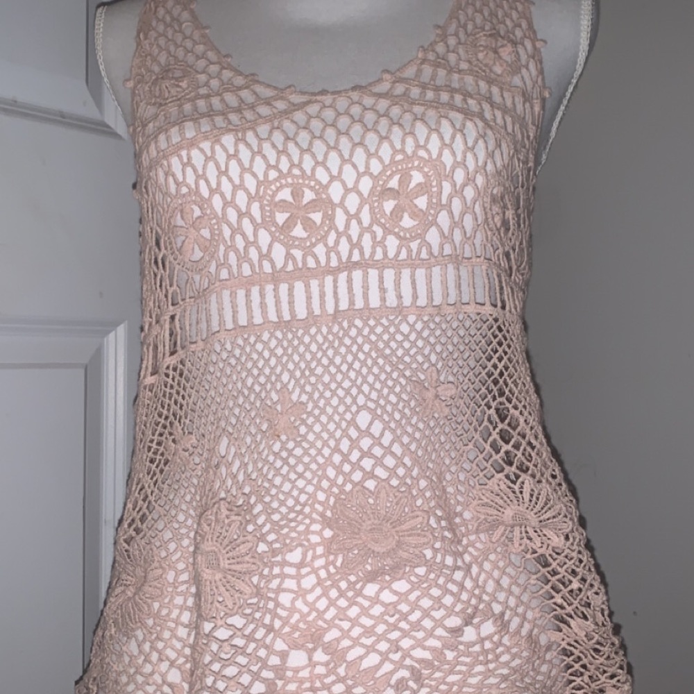 Pink cover-up top for a bathing suit see-through